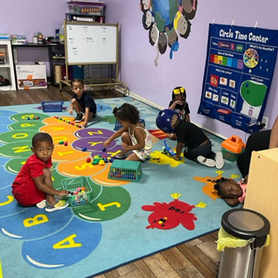 Children playing with a colorful blocks.